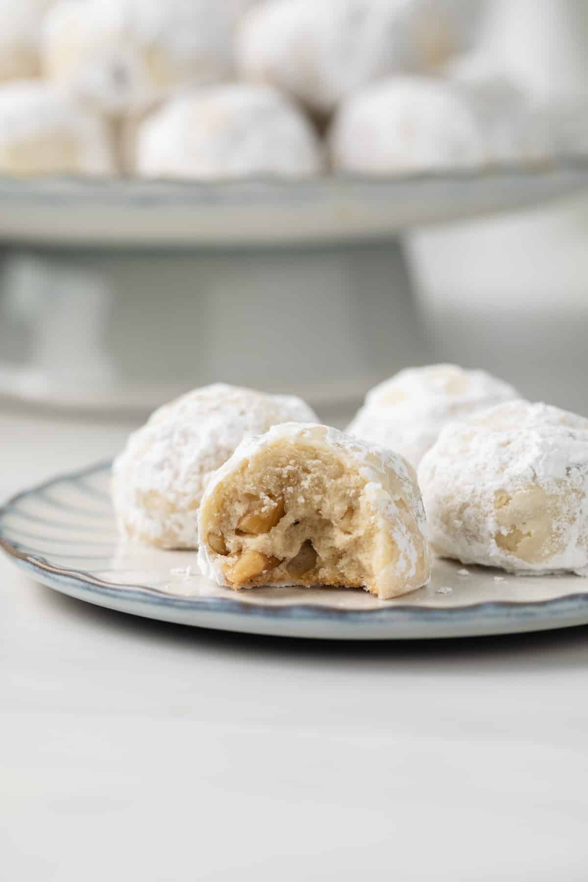 Russian tea cakes on a plate.