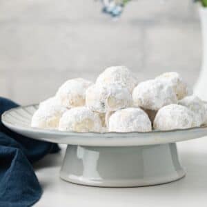 Russian tea cakes on cake stand.