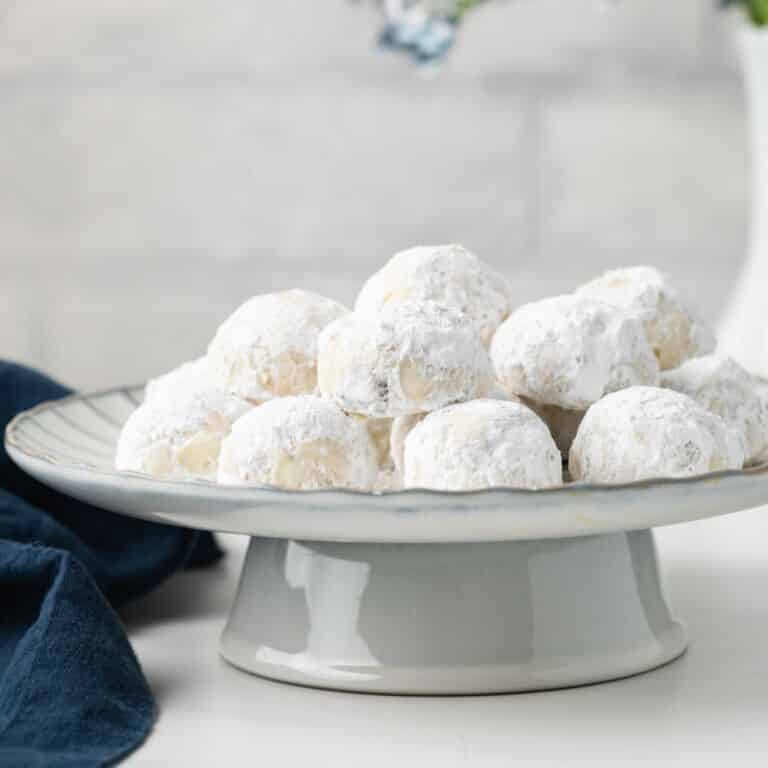 Russian tea cakes on cake stand.