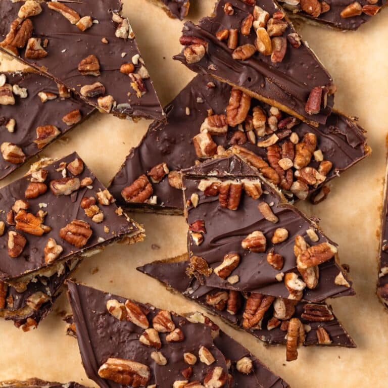 Saltine cracker toffee on parchment paper.