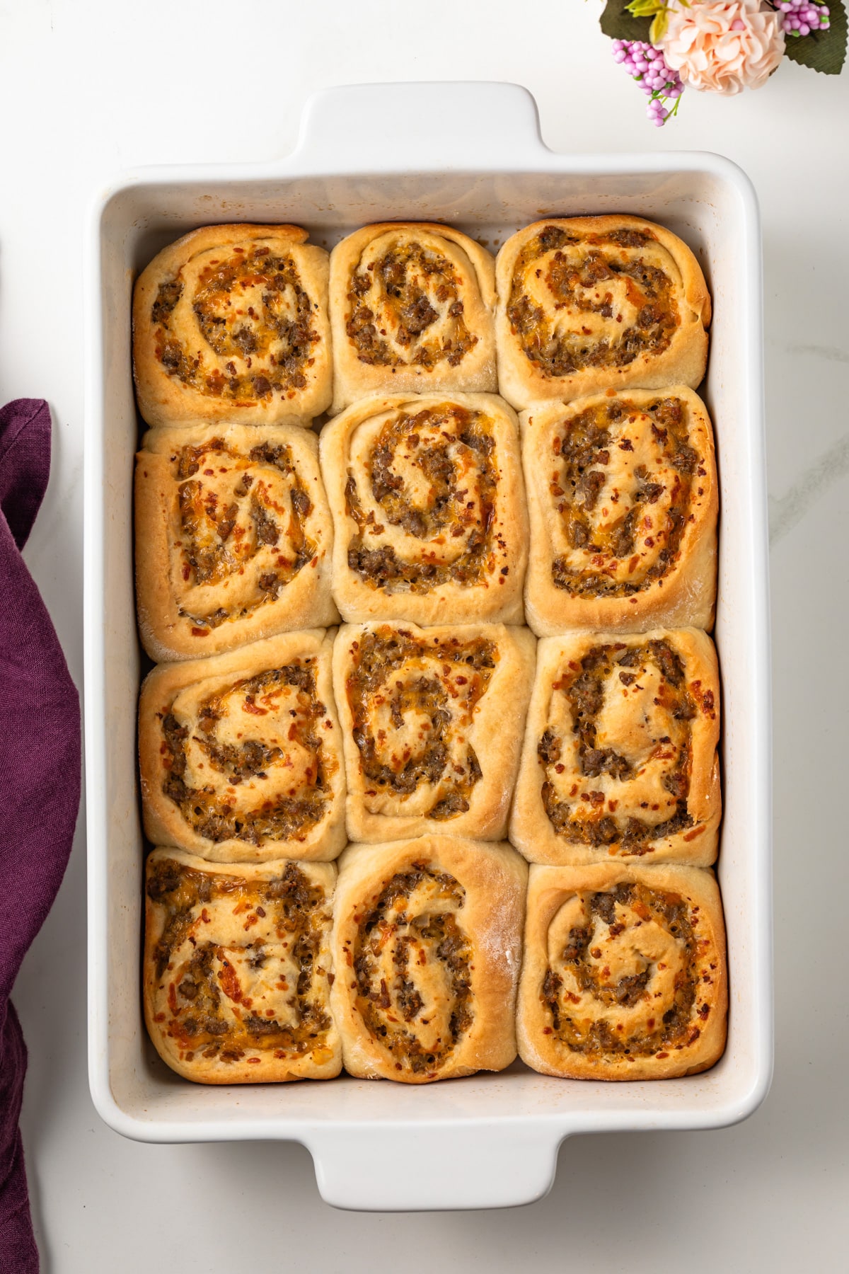 Breakfast rolls with sausage, egg, and cheese filling.