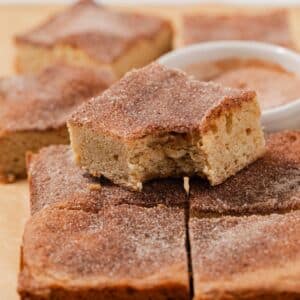 Snickerdoodle blondies with a bite taken out of one.