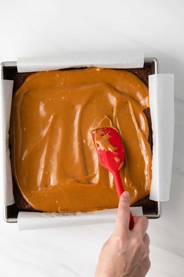 Melted caramel spread on brownies