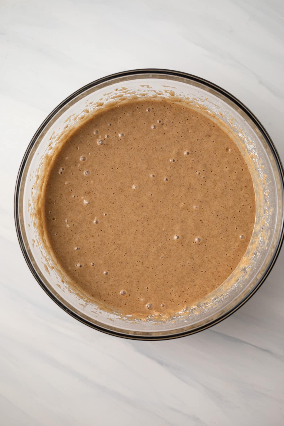 Spice cake batter in glass bowl.