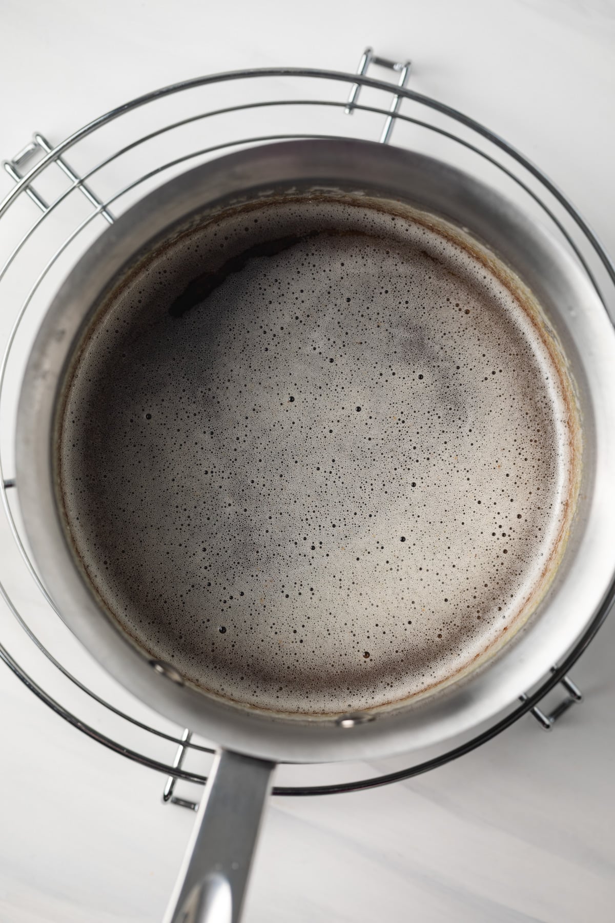 Brown butter in saucepan.