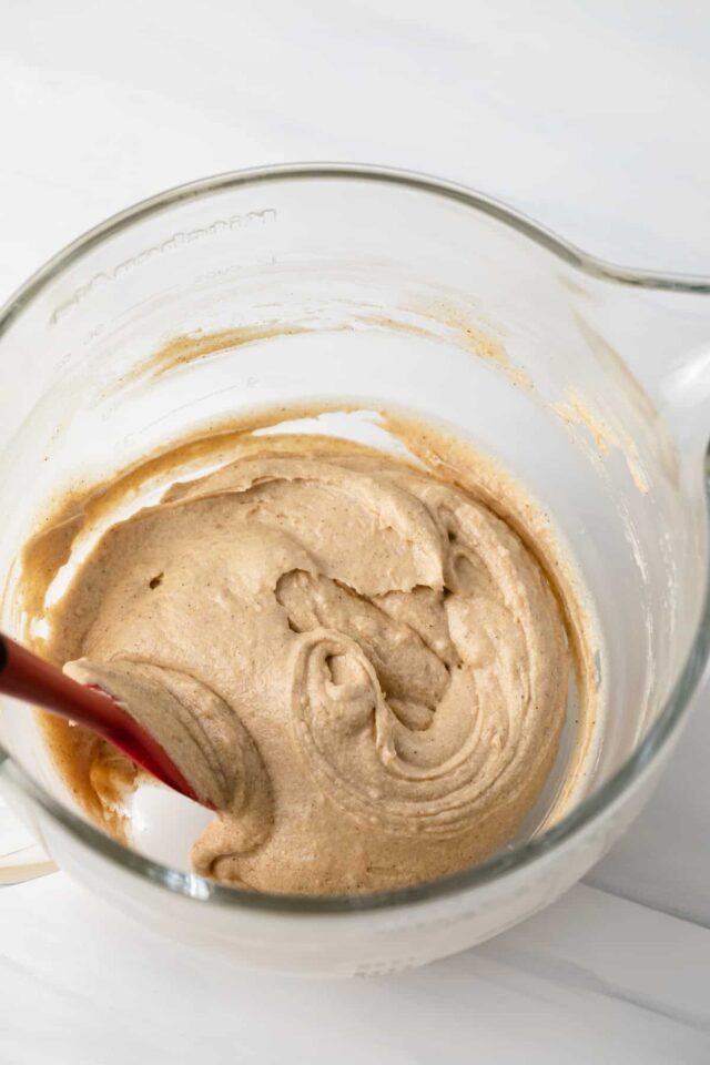 Spiced apple cupcake batter in a mixing bowl