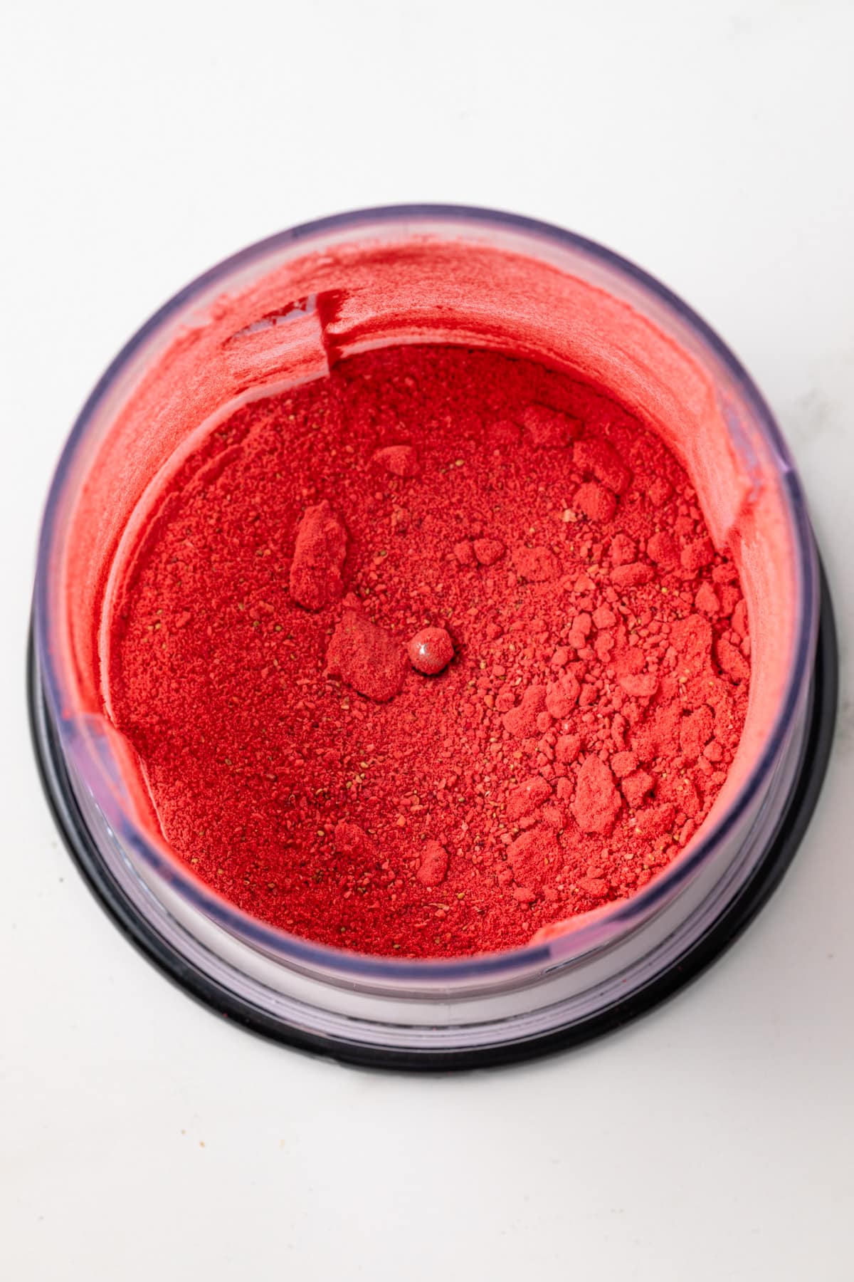 Freeze dried strawberry powder in blender.