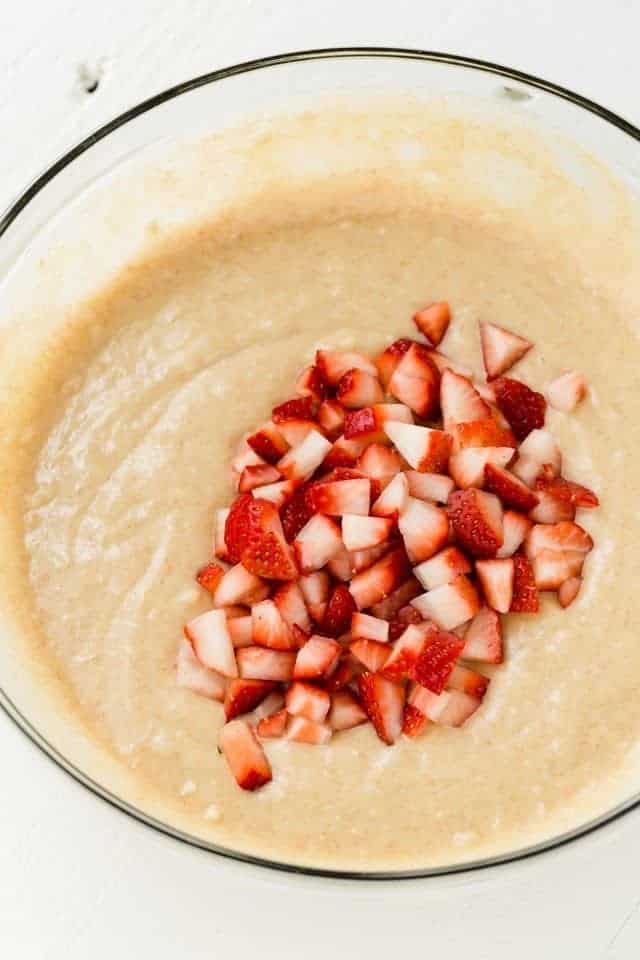 Strawberry donut batter in glass bowl