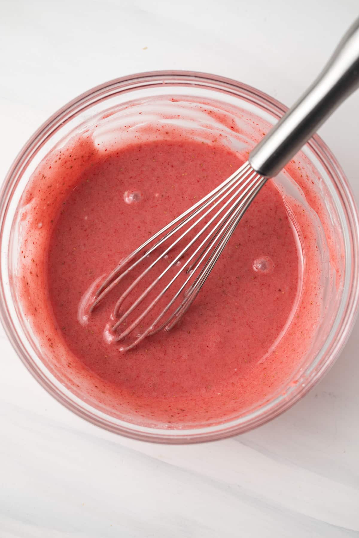 Strawberry glaze in glass bowl.