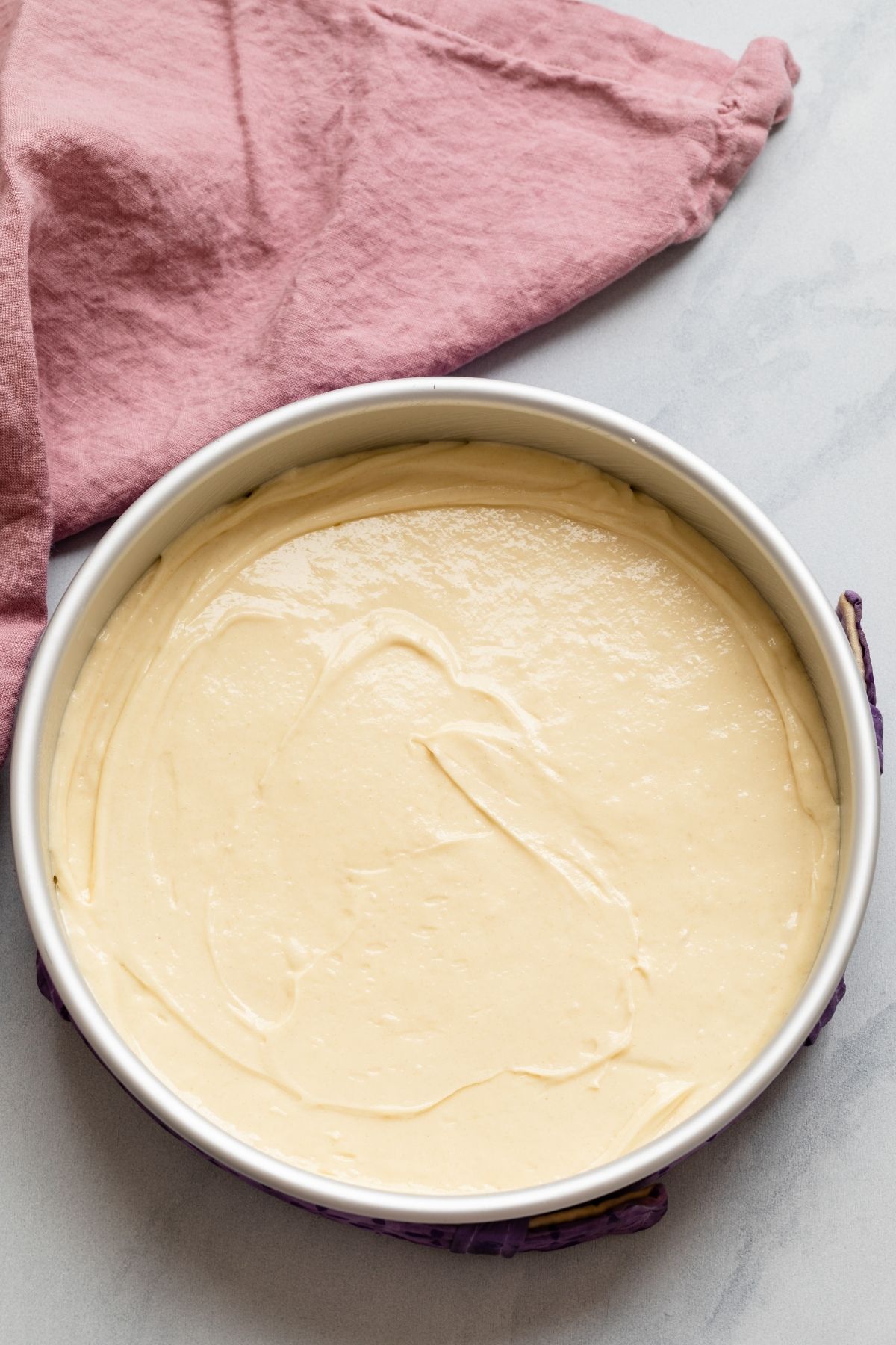 Cake batter in cake pan.