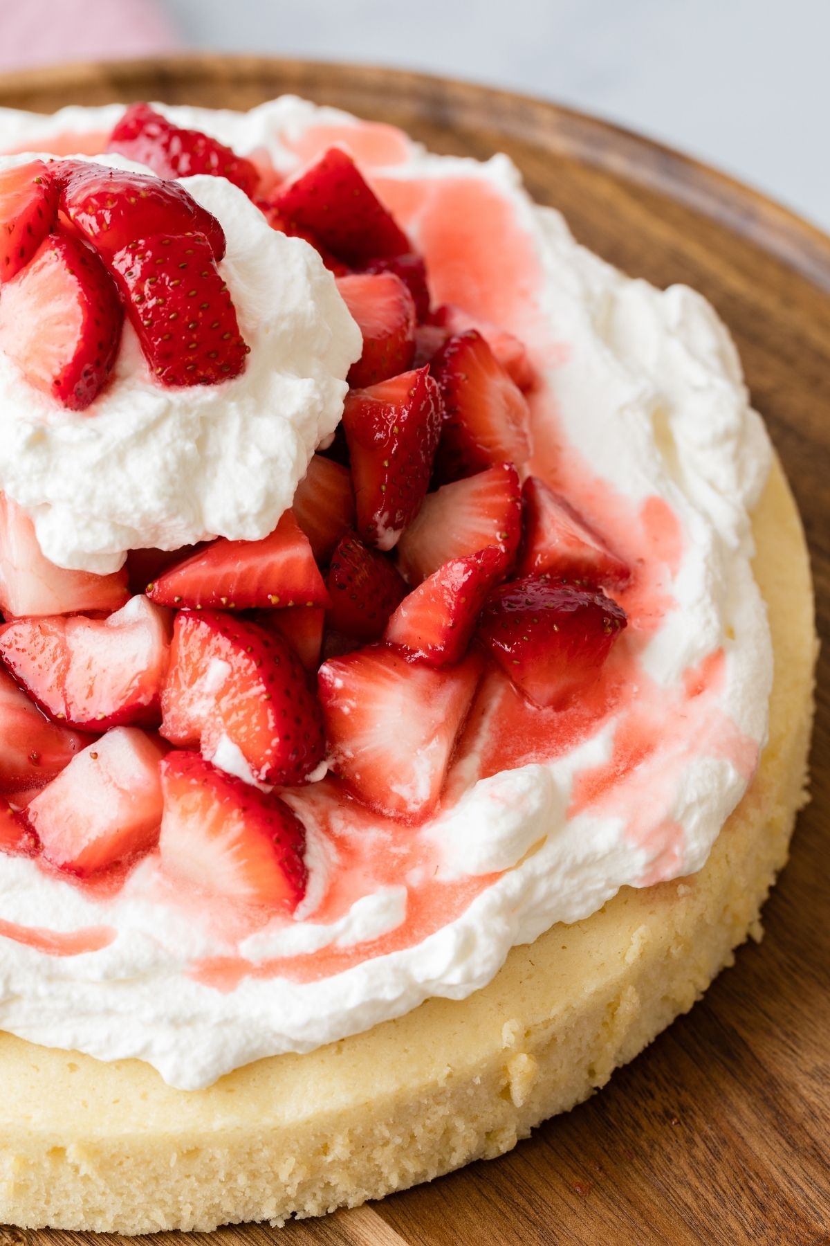 Overhead of one layer strawberry shortcake cake.