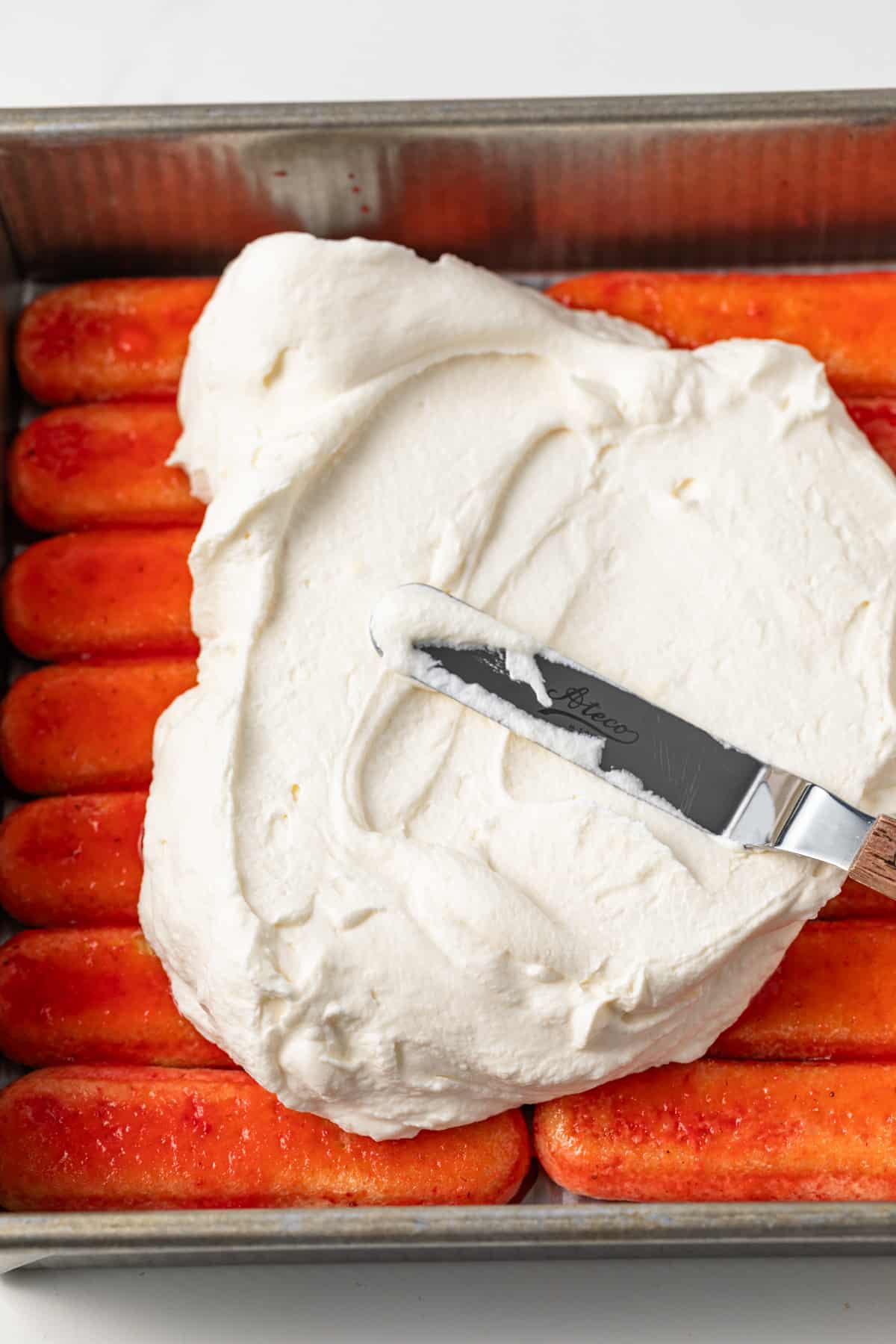 Whipped mascarpone cream spread over ladyfingers.