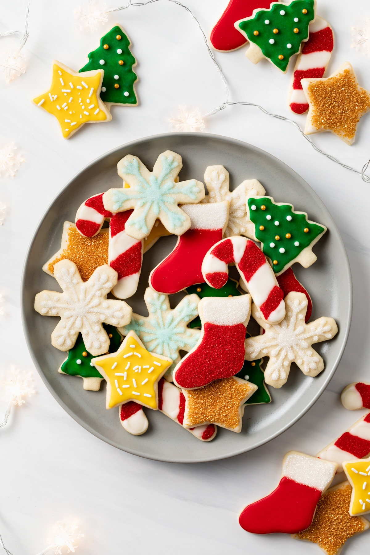 decorated sugar cookies on grey plate