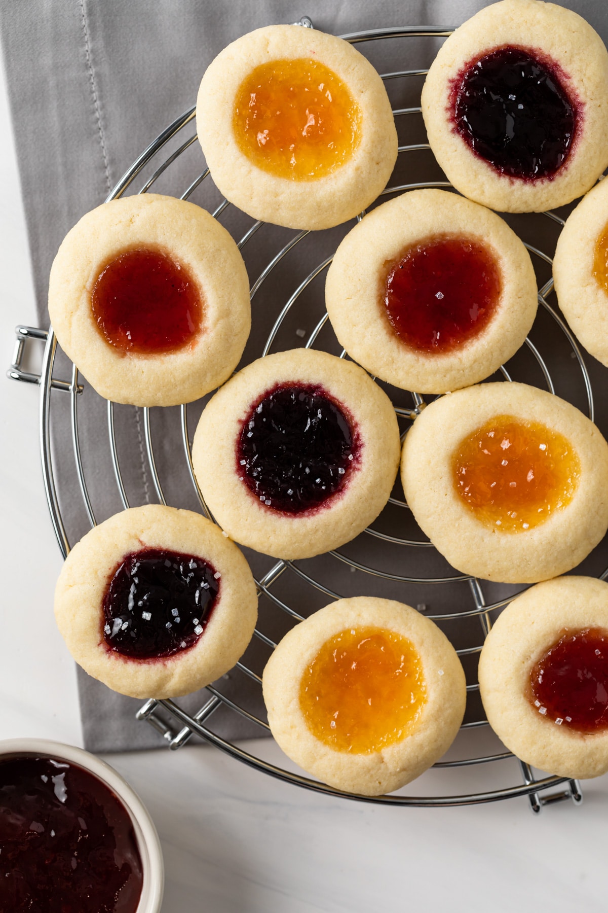 jam thumbprint cookies on wire rack