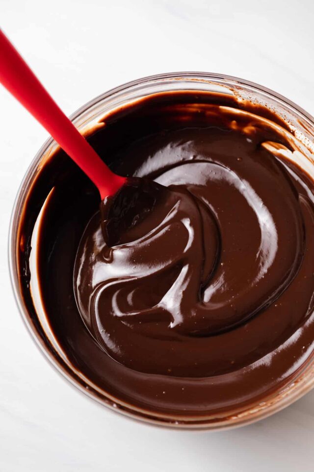 Chocolate ganache in glass bowl.