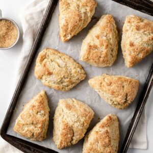 overhead view of vanilla cardamom scones on baking sheet