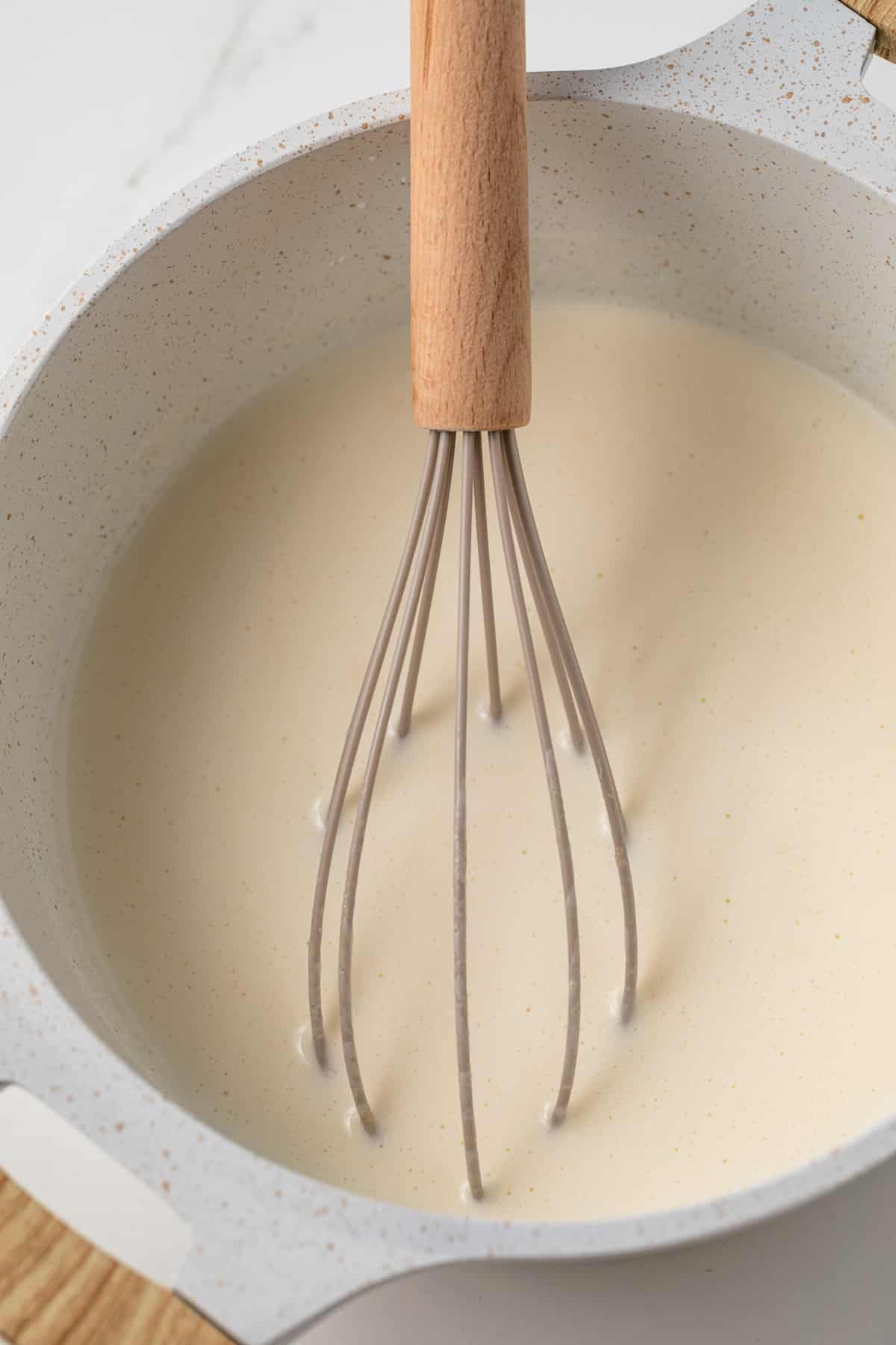 Ingredients mixed in saucepan.