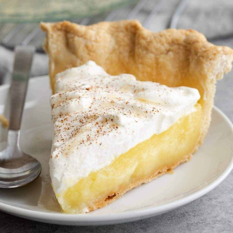 slice of vinegar pie on a white plate with fork