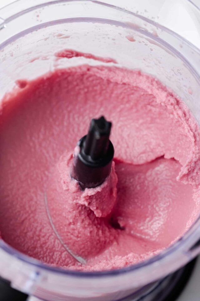 Watermelon sorbet in food processor.