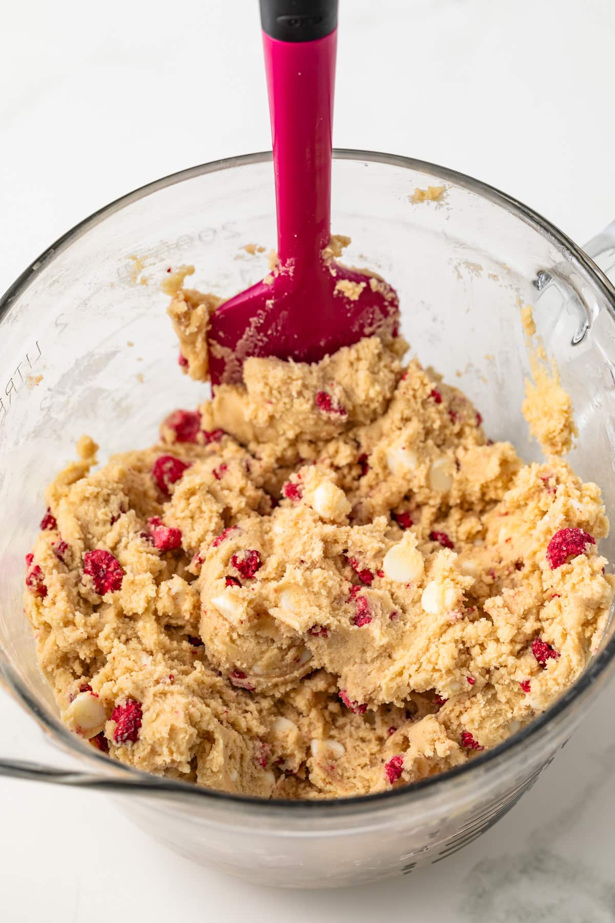 Cookie dough in glass bowl.