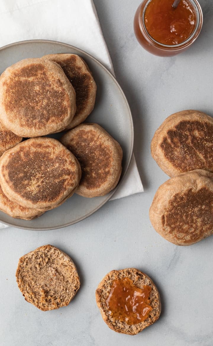 overhead of whole wheat on grey plate with white napkin